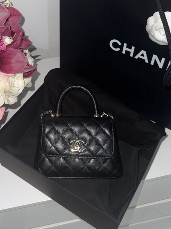 CHANEL Handbags - CHANEL White Quilted Mini Bag with Gold Accents